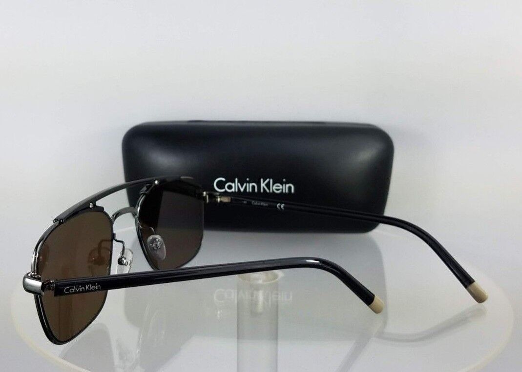 Brand New Authentic Calvin Klein Sunglasses CK 1221 060 Black Silver Frame 1221