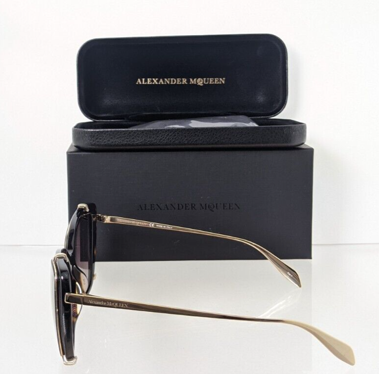 Brand New Authentic Alexander McQueen Sunglasses AM 0261 Gold 002 54mm Clip on