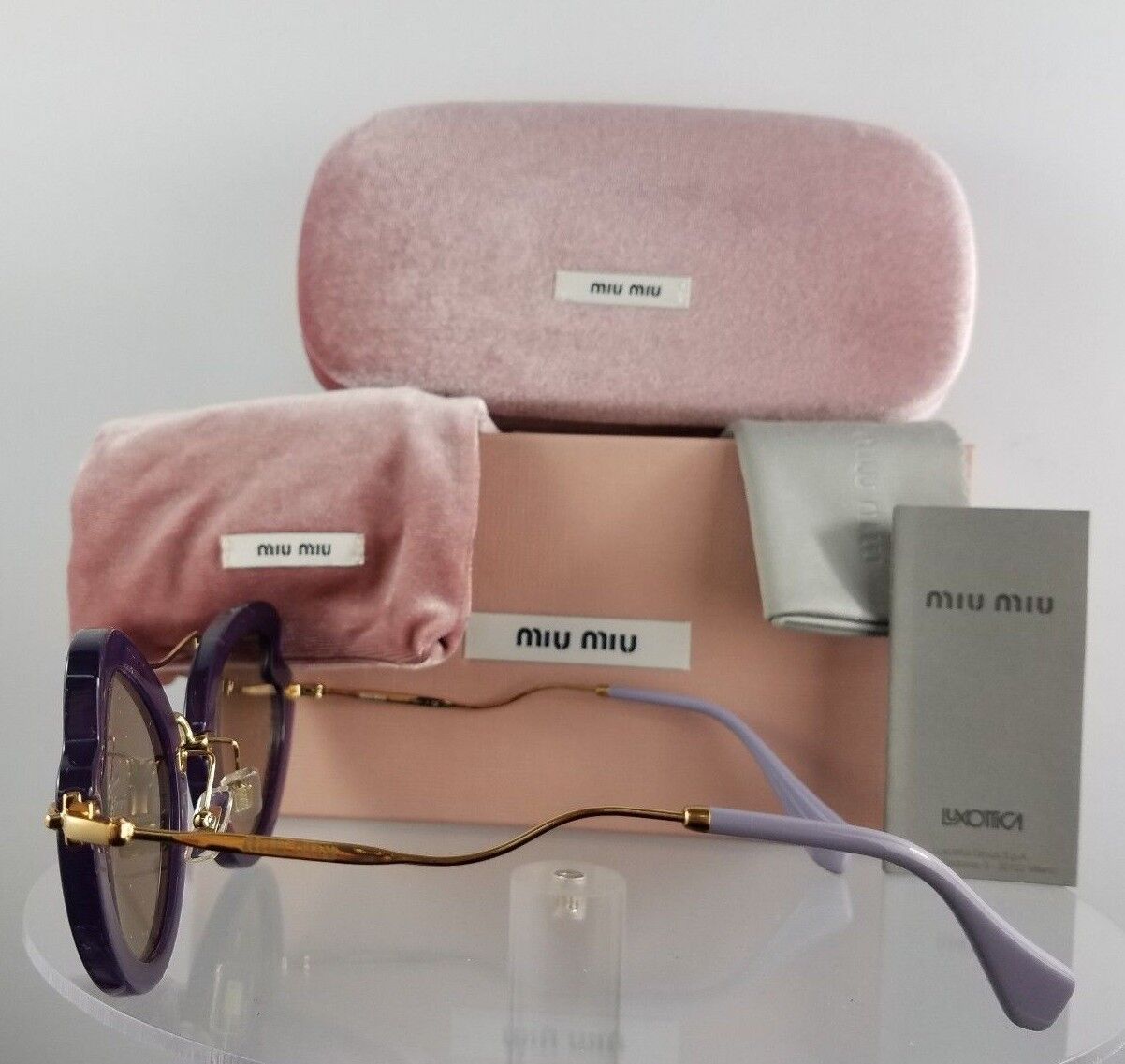 Brand New Authentic MIU MIU SMU 11R USV-5J2 Sunglasses Violet Gold Frame