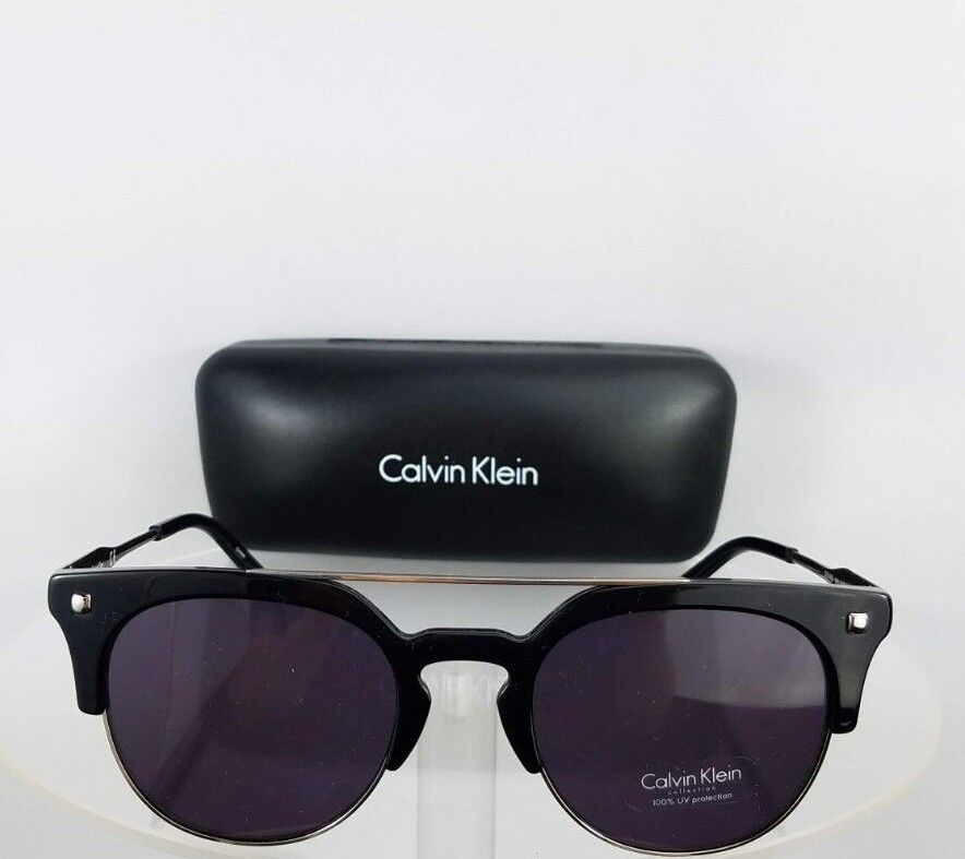 Brand New Authentic Calvin Klein Sunglasses CK 3199 0001 Silver Black Frame 3199