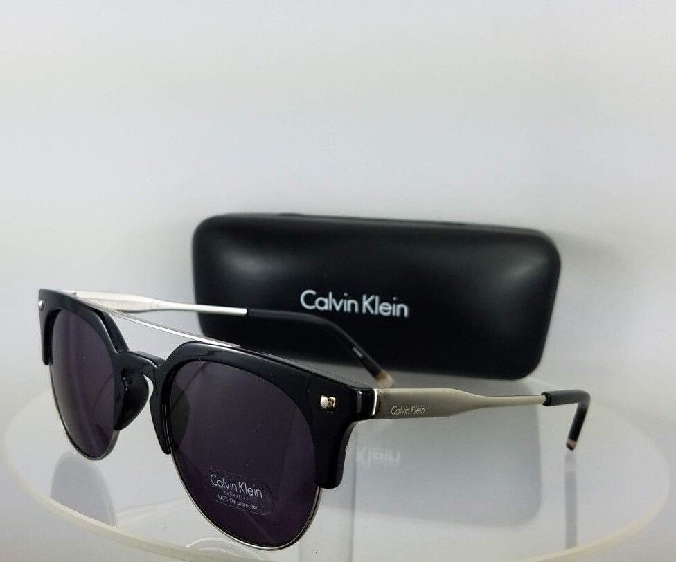 Brand New Authentic Calvin Klein Sunglasses CK 3199 0001 Silver Black Frame 3199