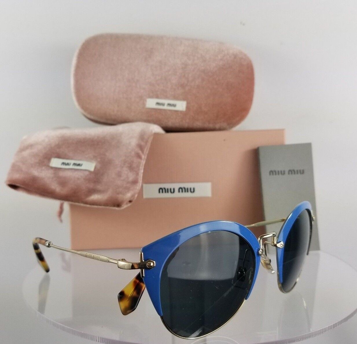 Brand New Authentic MIU MIU SMU 53R VAD-1A1 Sunglasses Blue Gold Frame