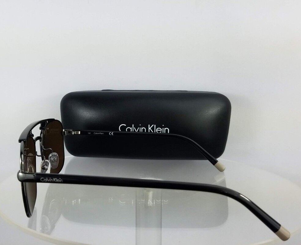 Brand New Authentic Calvin Klein Sunglasses CK 1221 060 Black Silver Frame 1221