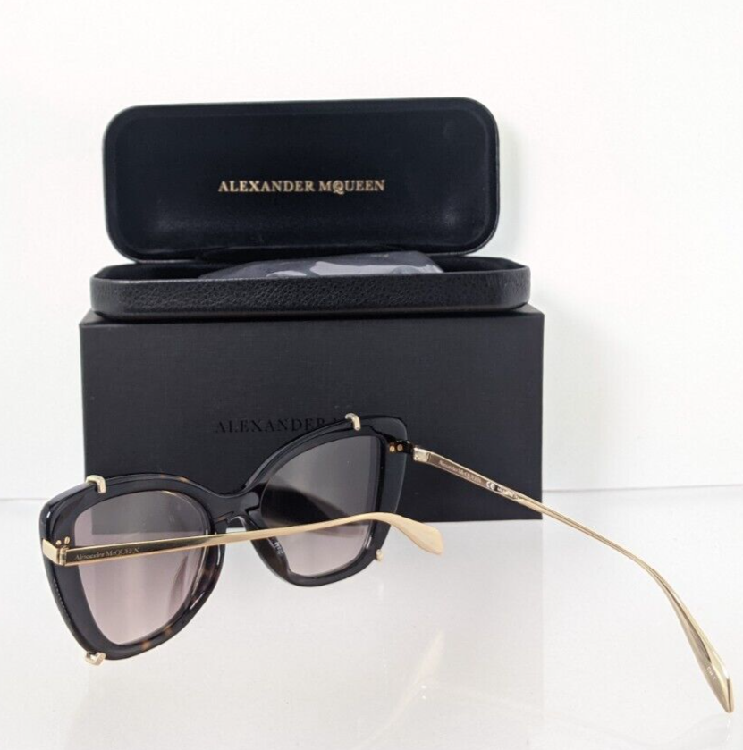 Brand New Authentic Alexander McQueen Sunglasses AM 0261 Gold 002 54mm Clip on