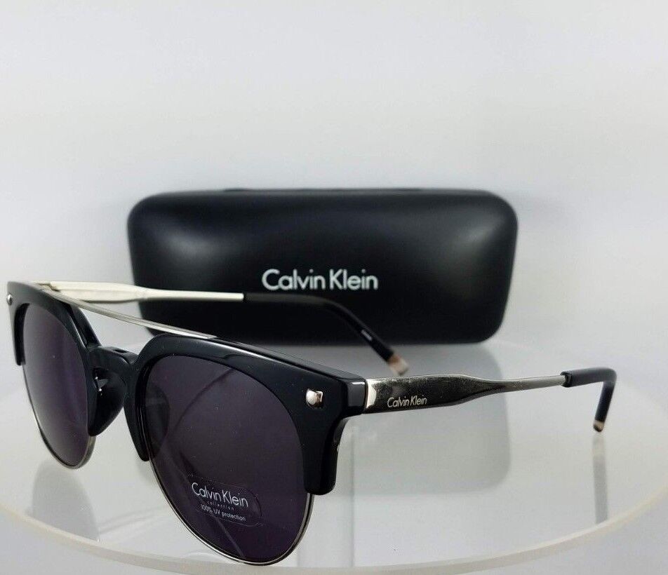 Brand New Authentic Calvin Klein Sunglasses CK 3199 0001 Silver Black Frame 3199