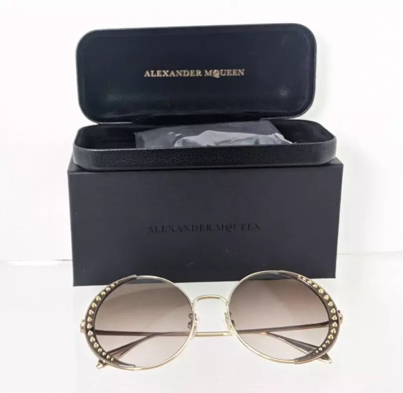 Brand New Authentic Alexander McQueen Sunglasses AM 0311 002 57mm Frame