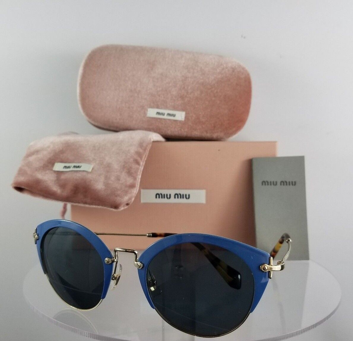 Brand New Authentic MIU MIU SMU 53R VAD-1A1 Sunglasses Blue Gold Frame