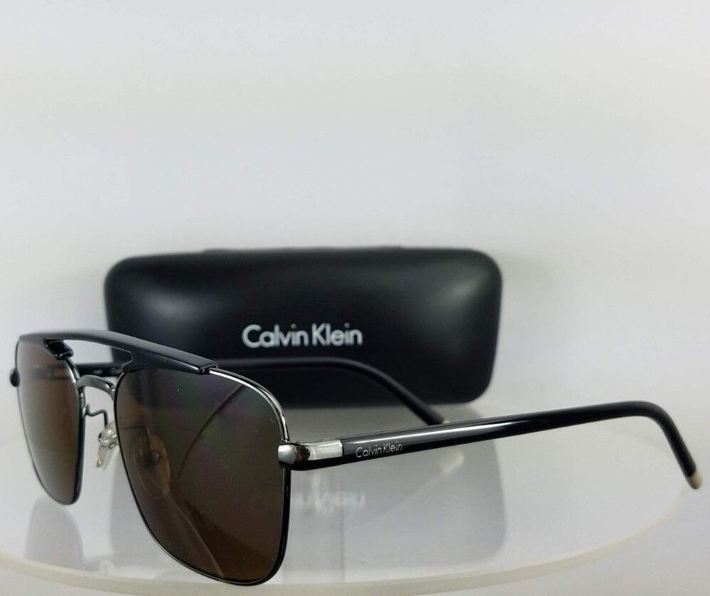 Brand New Authentic Calvin Klein Sunglasses CK 1221 060 Black Silver Frame 1221