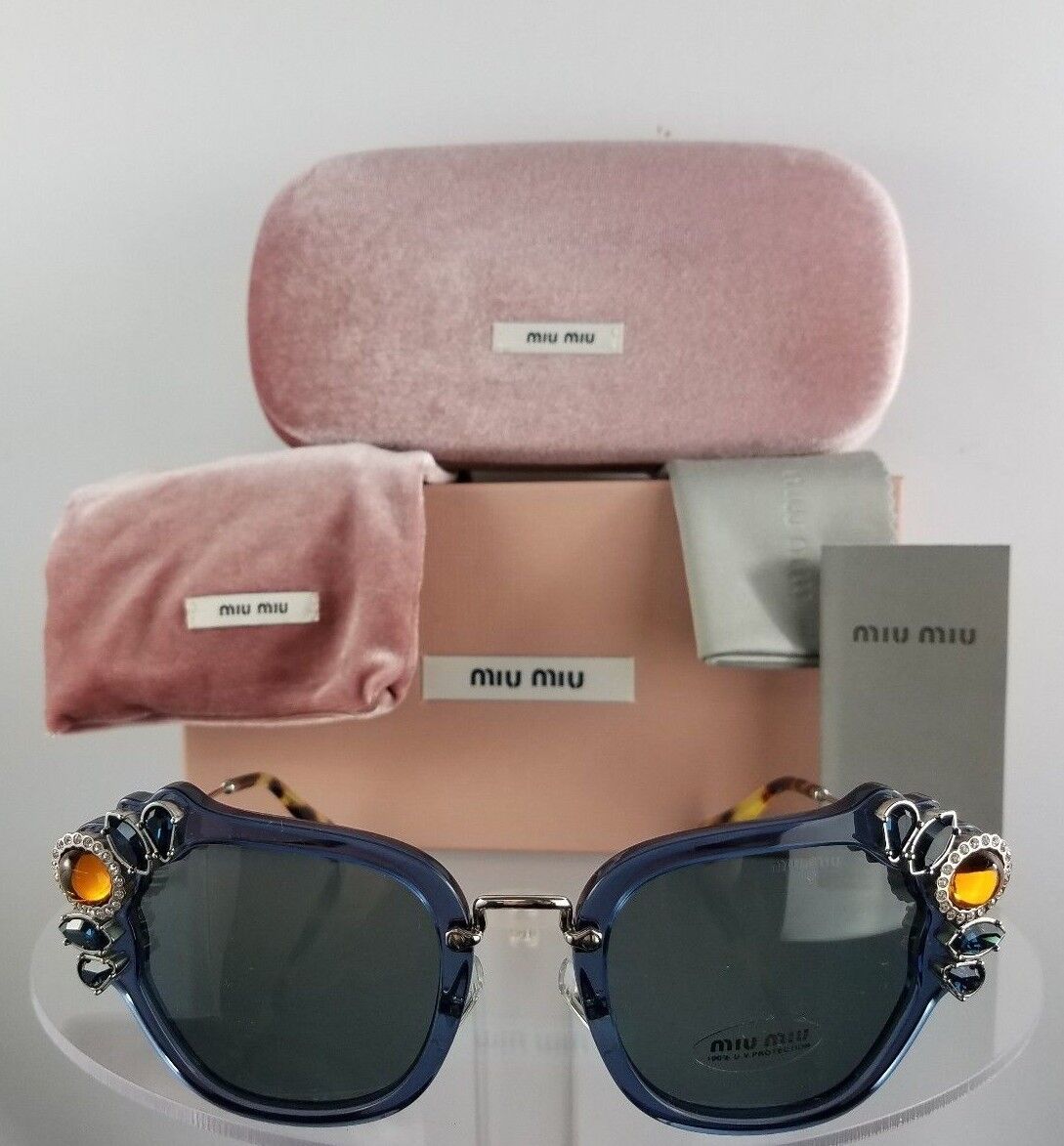 Brand New Authentic MIU MIU SMU 03S VAV-6Q0 Sunglasses