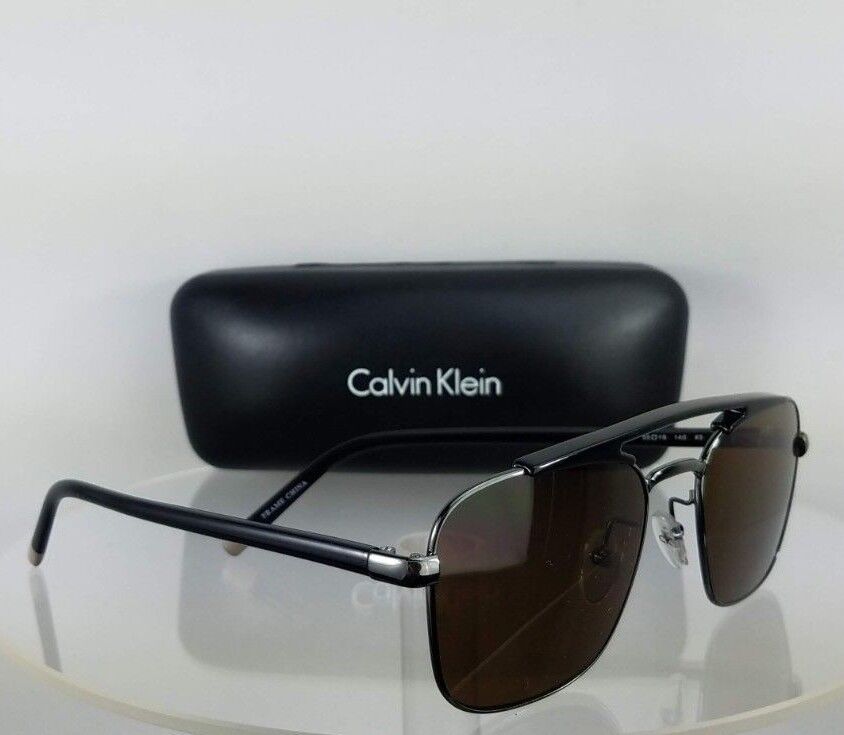 Brand New Authentic Calvin Klein Sunglasses CK 1221 060 Black Silver Frame 1221