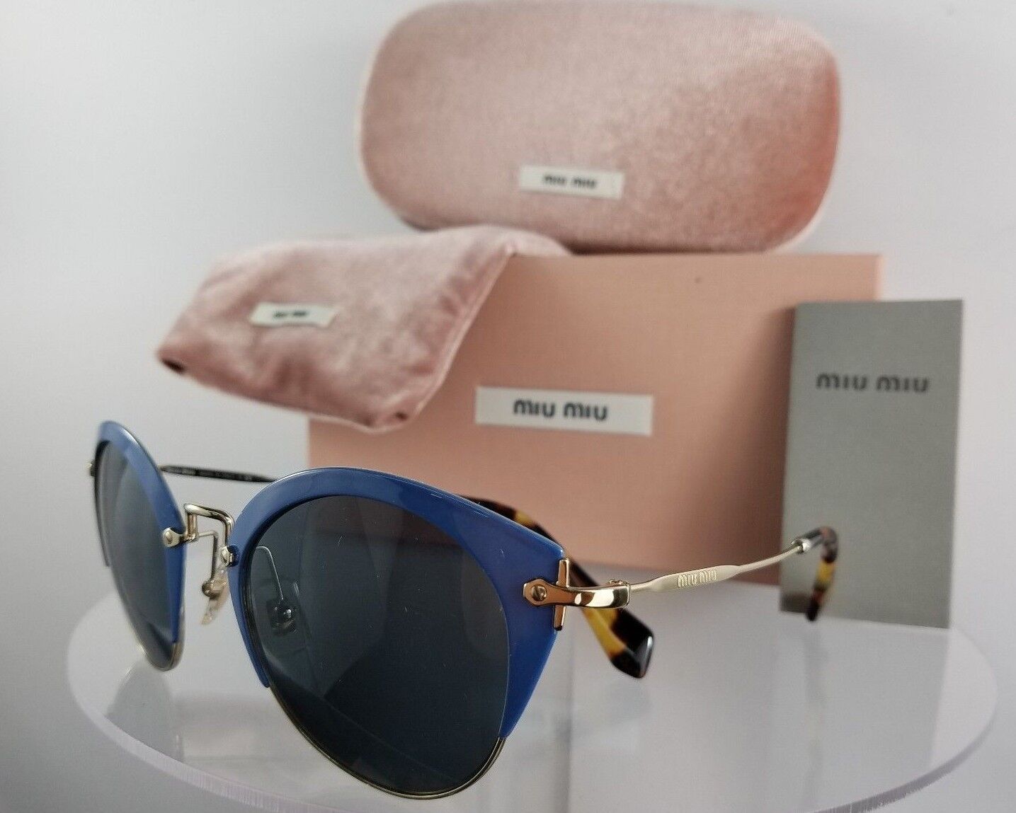 Brand New Authentic MIU MIU SMU 53R VAD-1A1 Sunglasses Blue Gold Frame