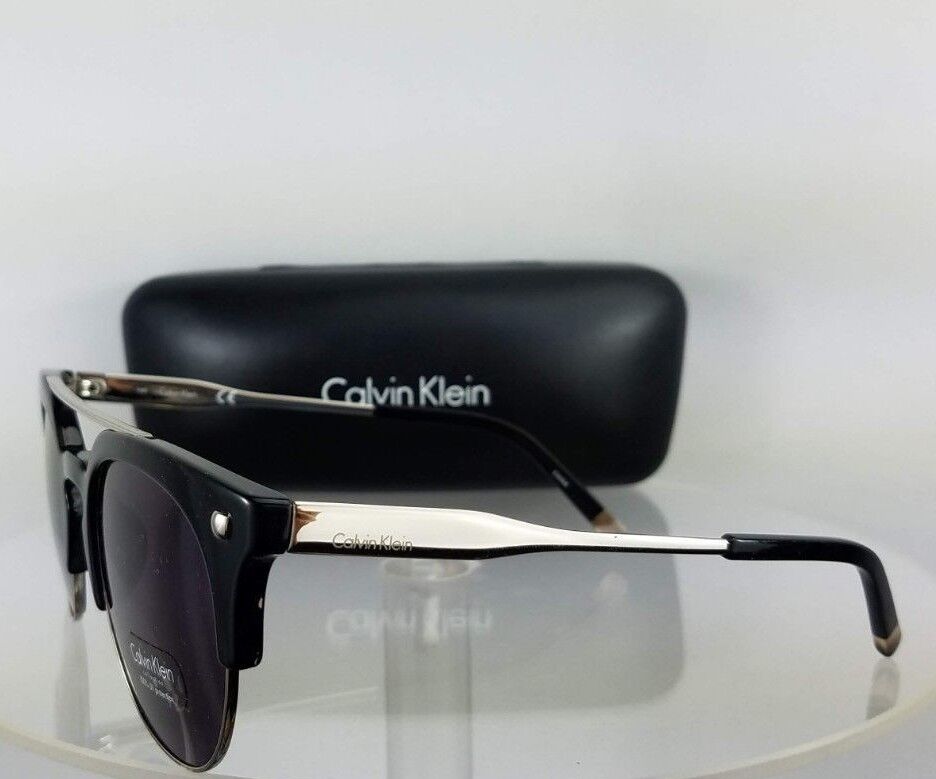 Brand New Authentic Calvin Klein Sunglasses CK 3199 0001 Silver Black Frame 3199