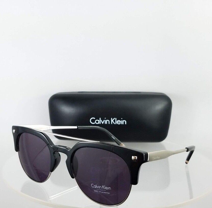 Brand New Authentic Calvin Klein Sunglasses CK 3199 0001 Silver Black Frame 3199