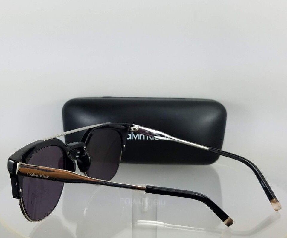 Brand New Authentic Calvin Klein Sunglasses CK 3199 0001 Silver Black Frame 3199