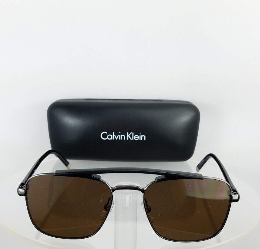 Brand New Authentic Calvin Klein Sunglasses CK 1221 060 Black Silver Frame 1221