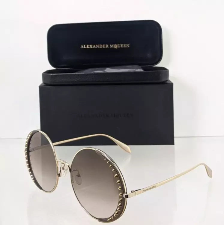 Brand New Authentic Alexander McQueen Sunglasses AM 0311 002 57mm Frame