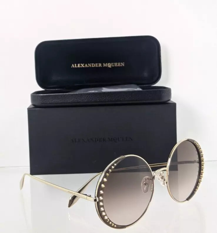 Brand New Authentic Alexander McQueen Sunglasses AM 0311 002 57mm Frame