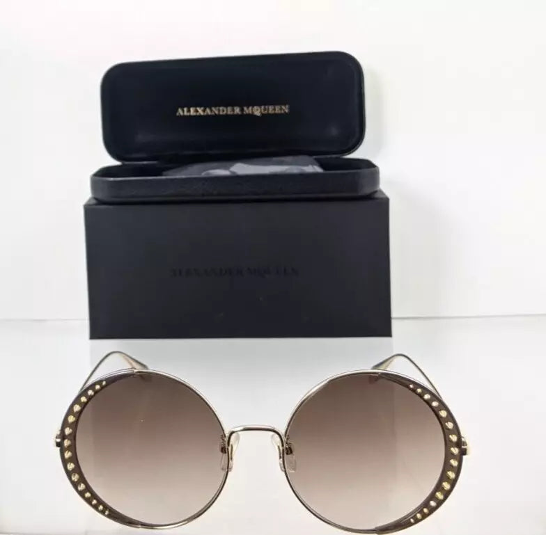 Brand New Authentic Alexander McQueen Sunglasses AM 0311 002 57mm Frame