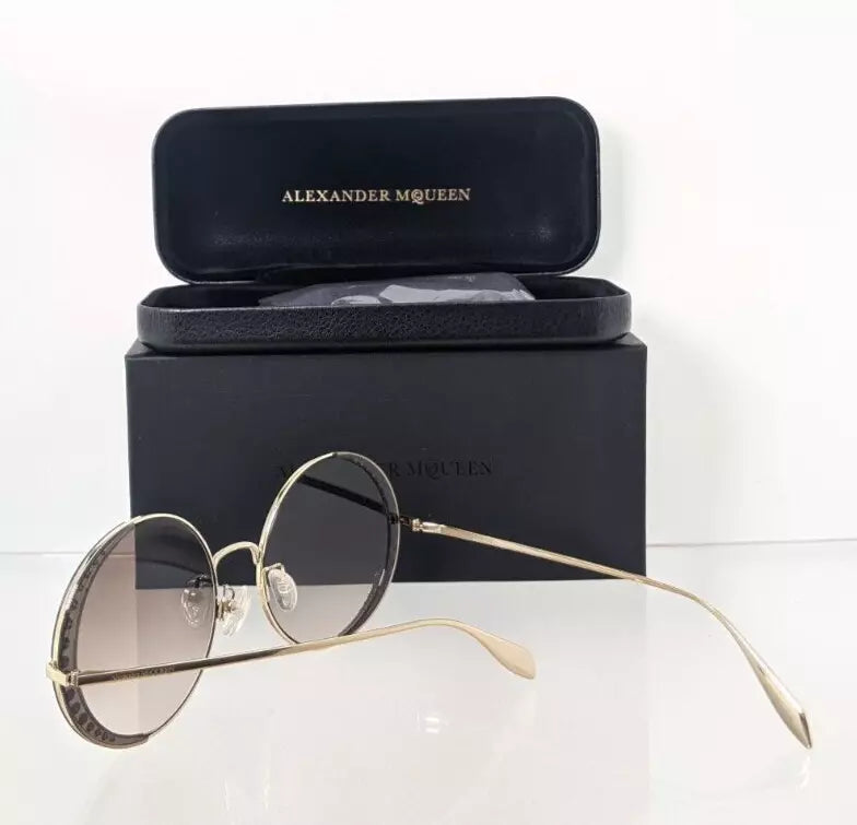 Brand New Authentic Alexander McQueen Sunglasses AM 0311 002 57mm Frame