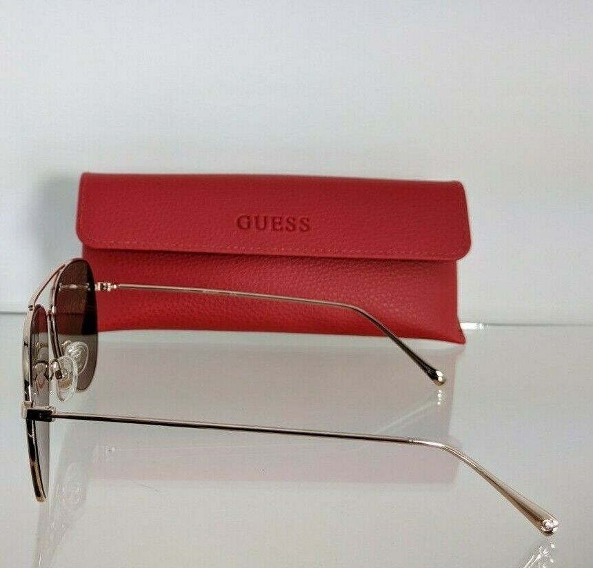 Brand New Authentic Guess Sunglasses GG 1142 28C 56mm GG 1142 Frame