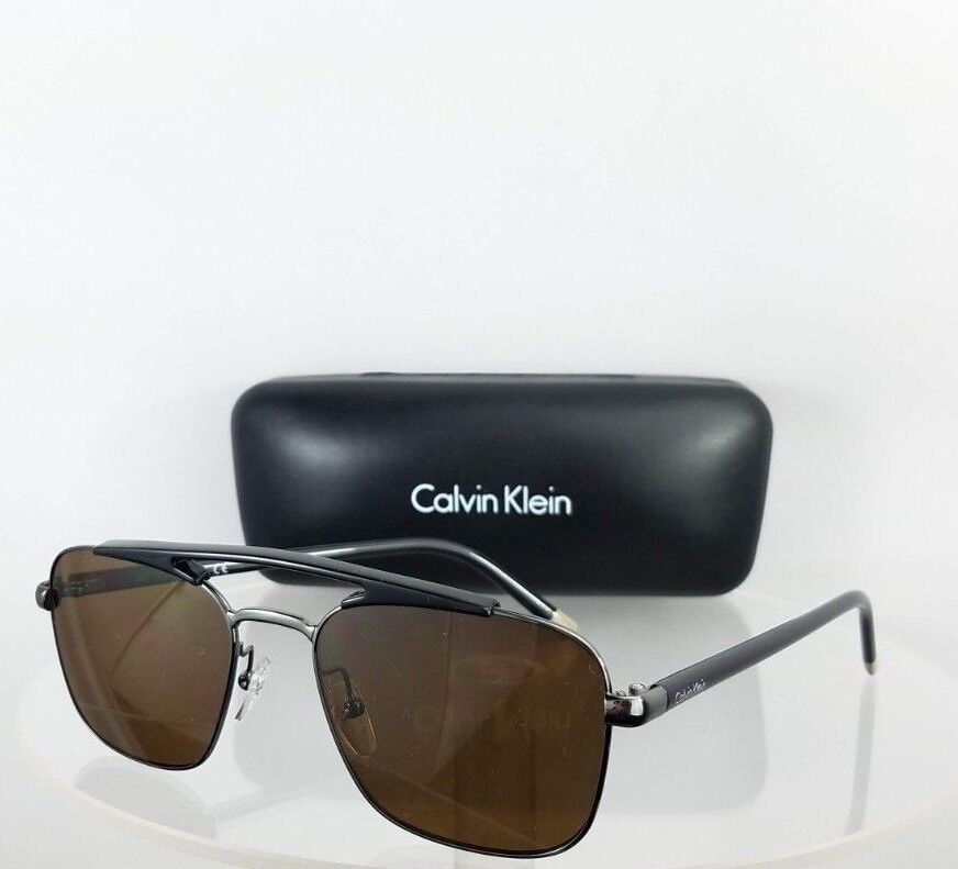 Brand New Authentic Calvin Klein Sunglasses CK 1221 060 Black Silver Frame 1221