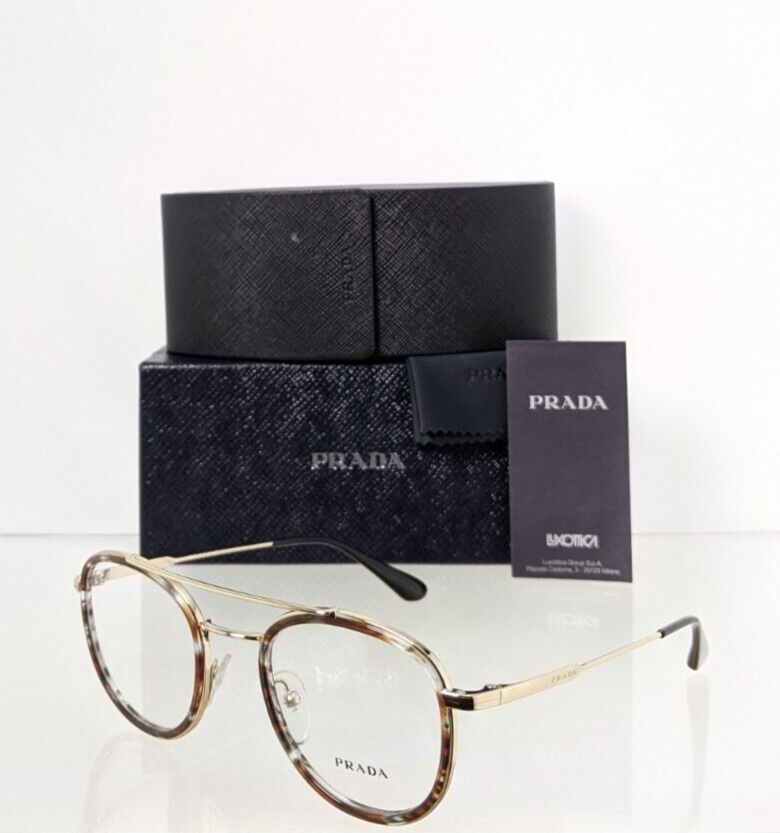 Brand New Authentic Prada Eyeglasses VPR 66X 06A - 1O1 56mm Frame 50Y