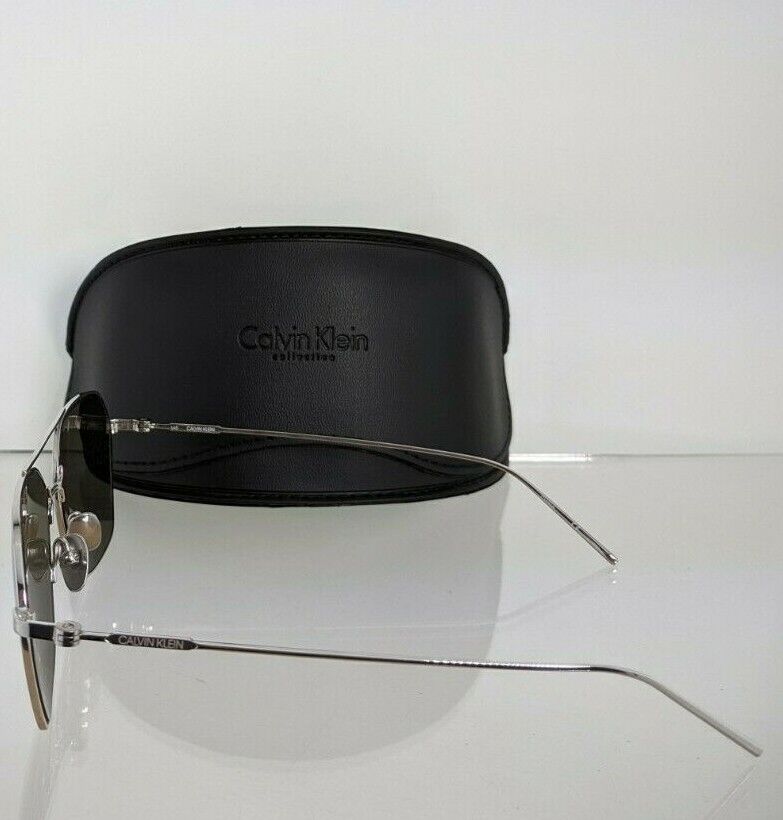 Brand New Authentic Calvin Klein Sunglasses CK 18112 046 Silver Frame 18112